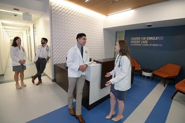 Students in the lobby of the Center for Simulated Patient Care